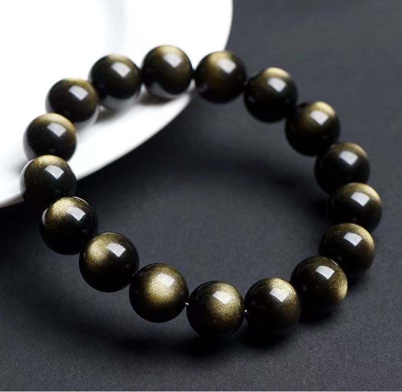 Pulsera de obsidiana negra 7A ojo de oro y plata natural